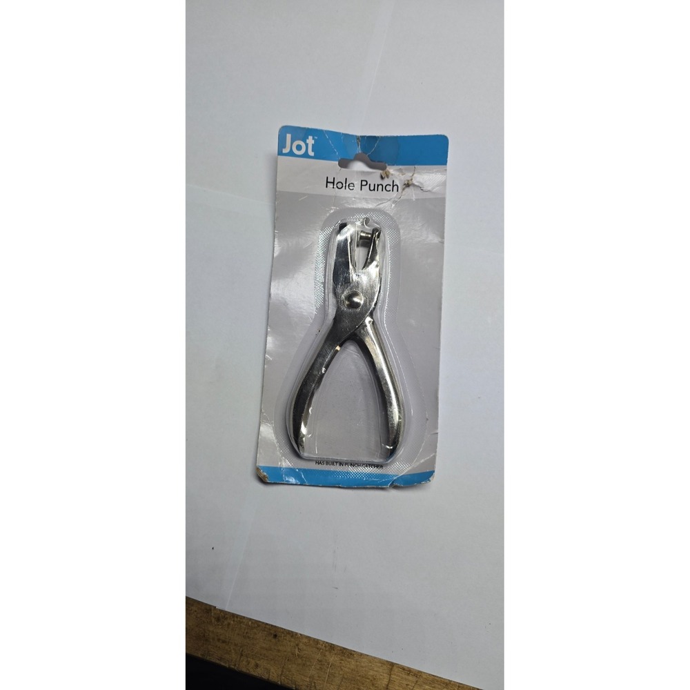 hole punch new for paper has built in punch catcher
